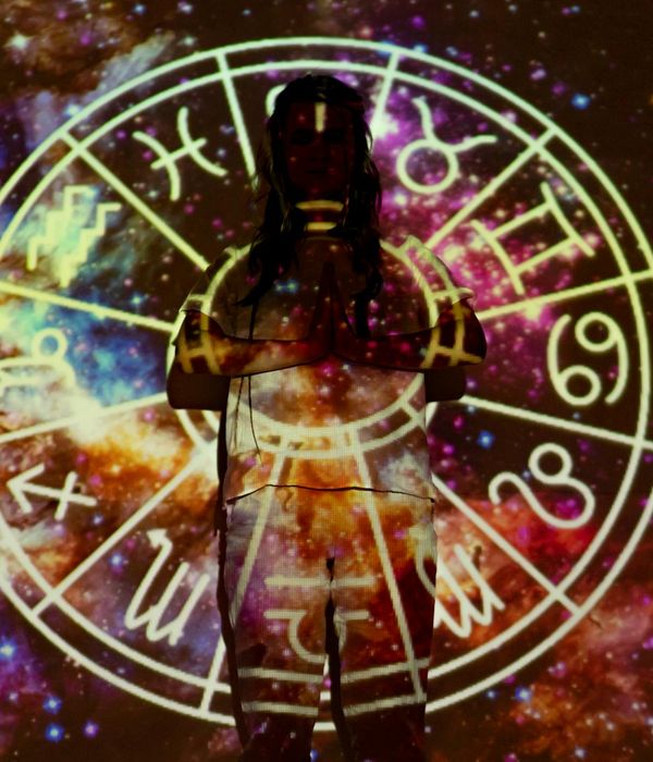 Woman performing a light cardio exercise in a bright, modern space.